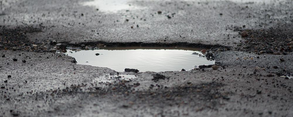 Illinois pothole accident injury lawyer